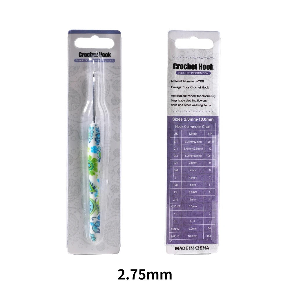 Crochet hook with packaging and measurement chart on a white background