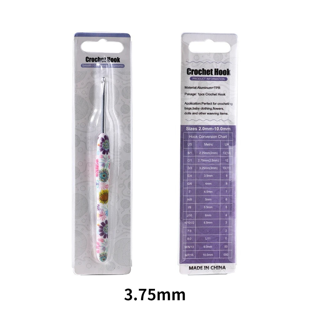 Crochet hook size 3.75mm with floral design in packaging on a white background