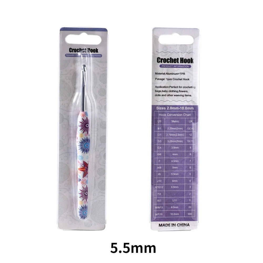 5.5mm Crochet hook with floral design in packaging on a white background