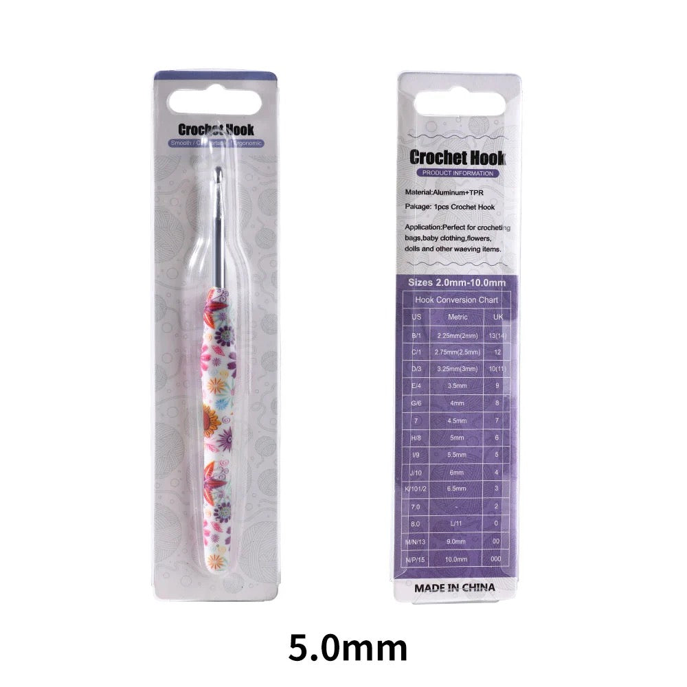 5mm Crochet hook with floral pattern in packaging on a white background