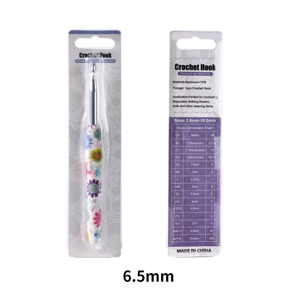 6.5mm Crochet hook with floral design in packaging on a white background