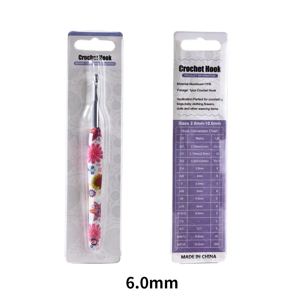 6mm Crochet hook with floral design in packaging on a white background