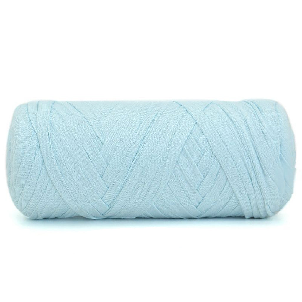 Light blue skein of yarn on a white background
