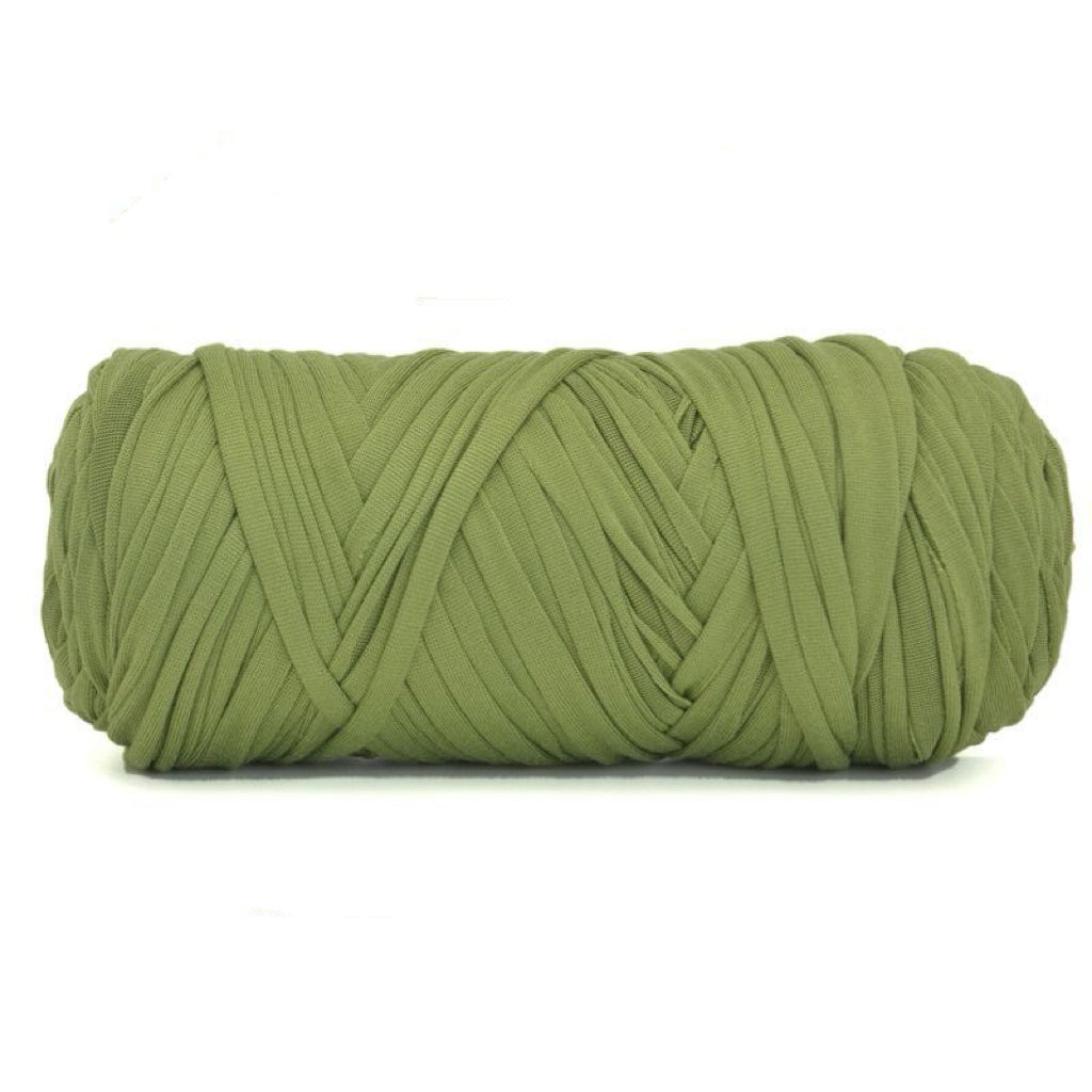 Green skein of yarn on a white background