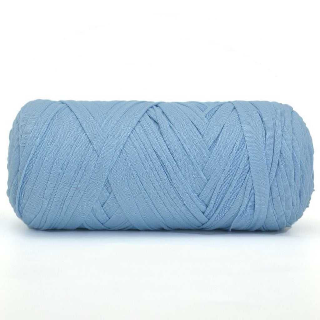Blue skein of yarn on a white background