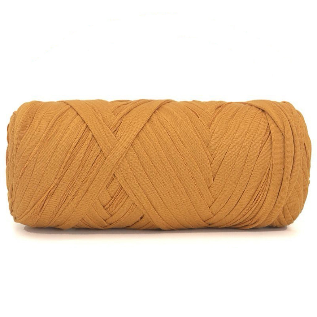 Brown skein of t-shirt yarn ball on a white background