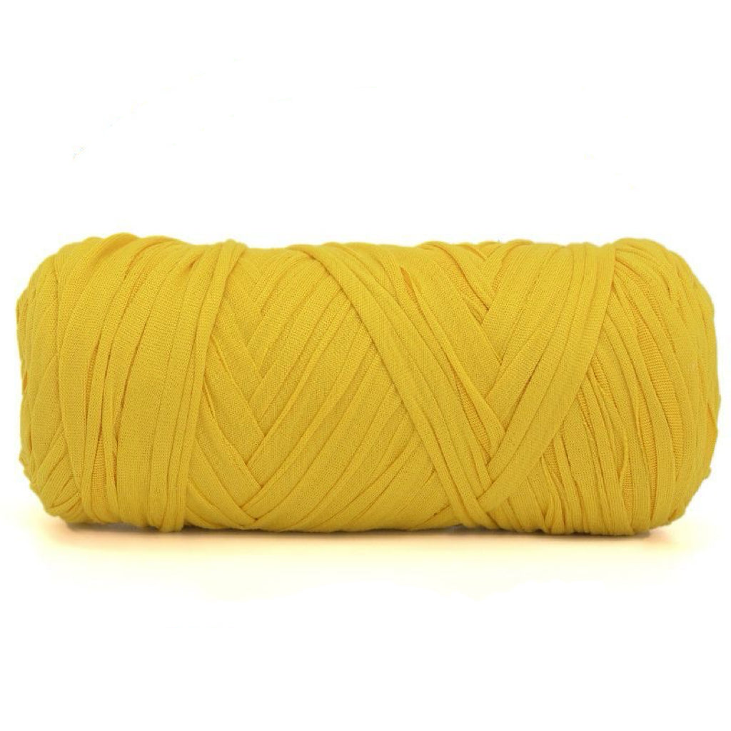 Yellow yarn ball on a white background