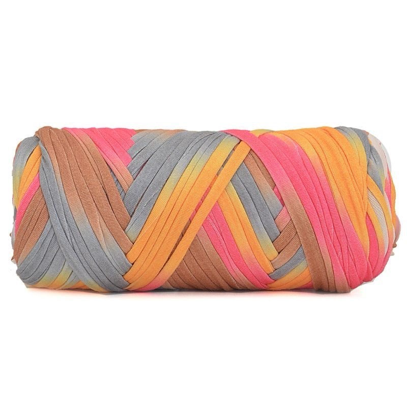 Multicolored yarn roll on a white background
