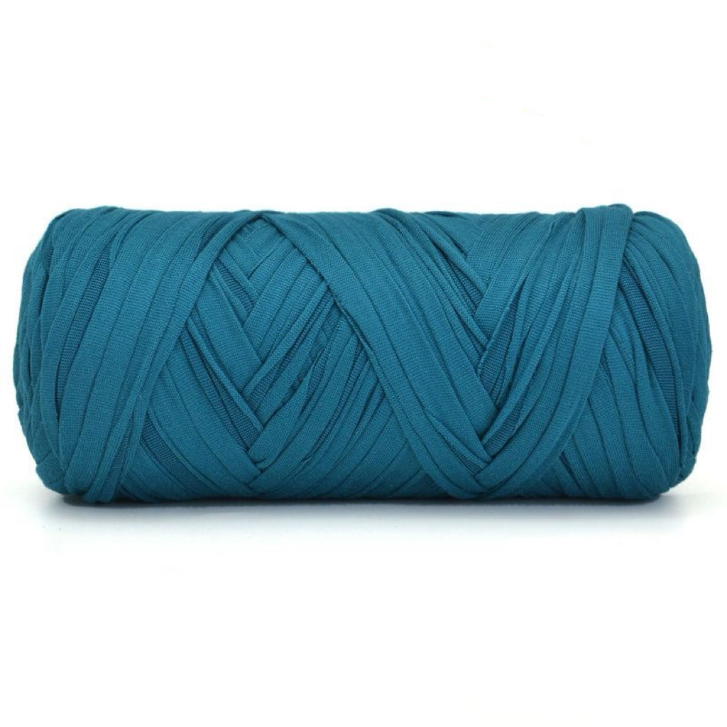 Blue T-shirt yarn ball on a white background