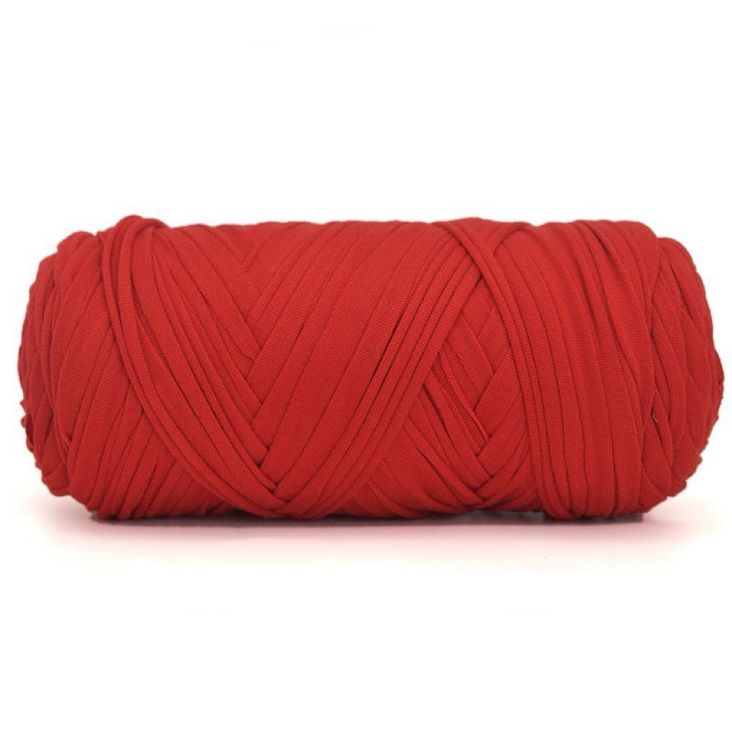 Red yarn ball on a white background