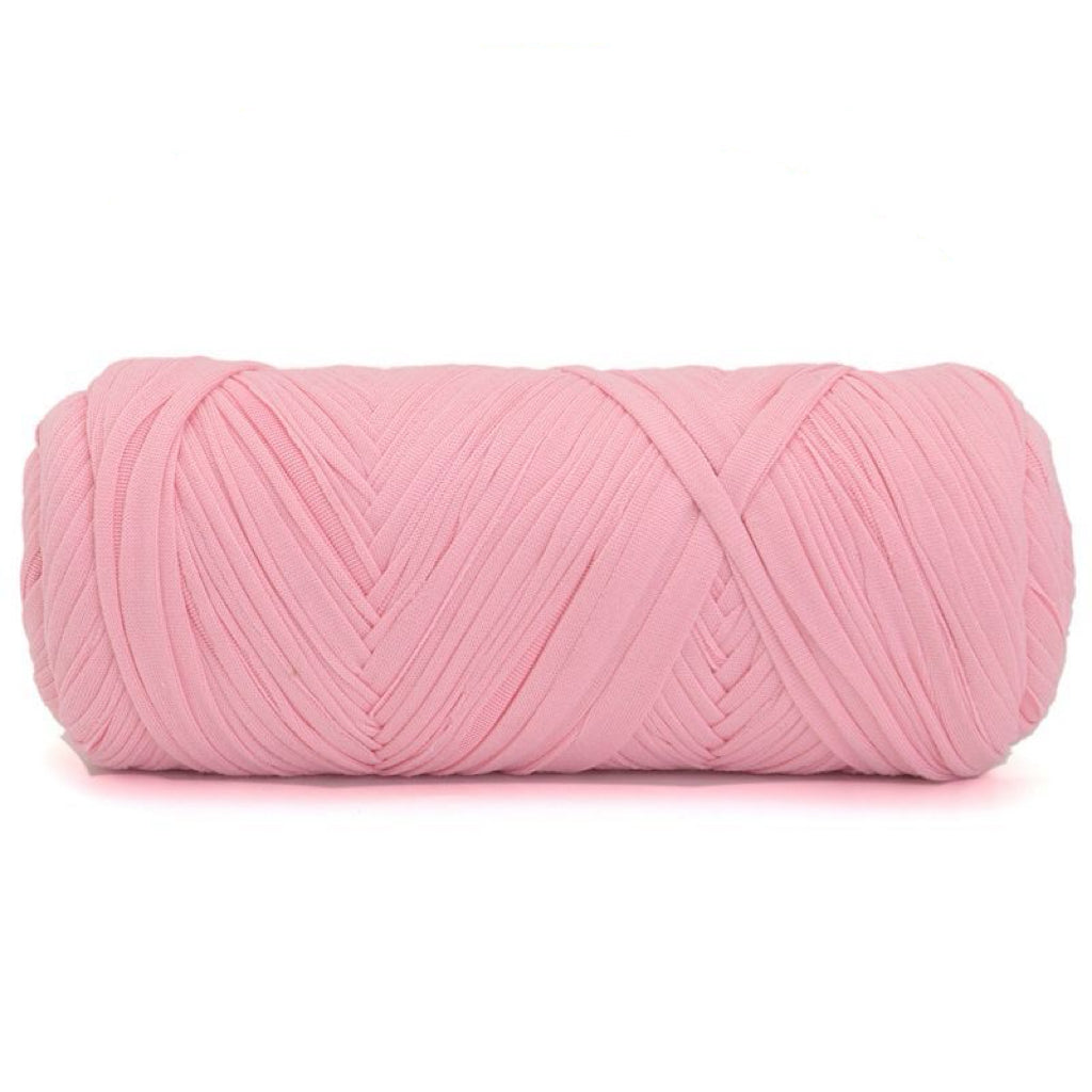 Pink skein of yarn on a white background